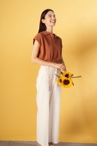Keith Sleeveless Knit Top in Tangerine