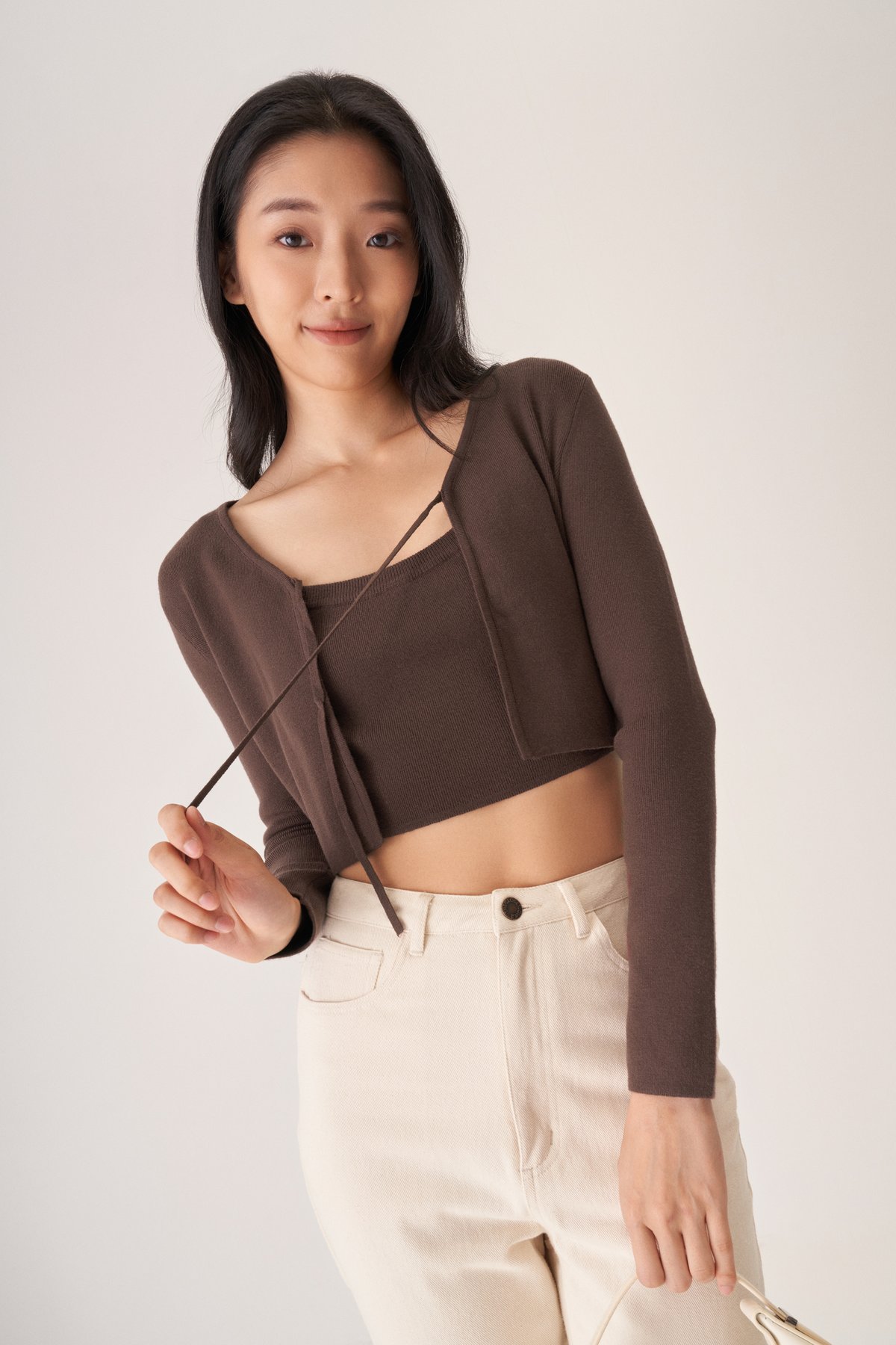 https://dum76bmz7do3s.cloudfront.net/sites/files/theclosetlover/images/products/202305/1200xAUTO/_celine_knit_crop_top_in_walnut5.jpg