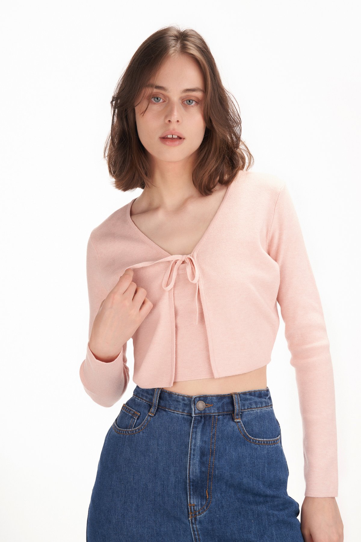 https://dum76bmz7do3s.cloudfront.net/sites/files/theclosetlover/images/products/202309/1200xAUTO/celine_knit_crop_cardigan_in_pink3_0.jpg