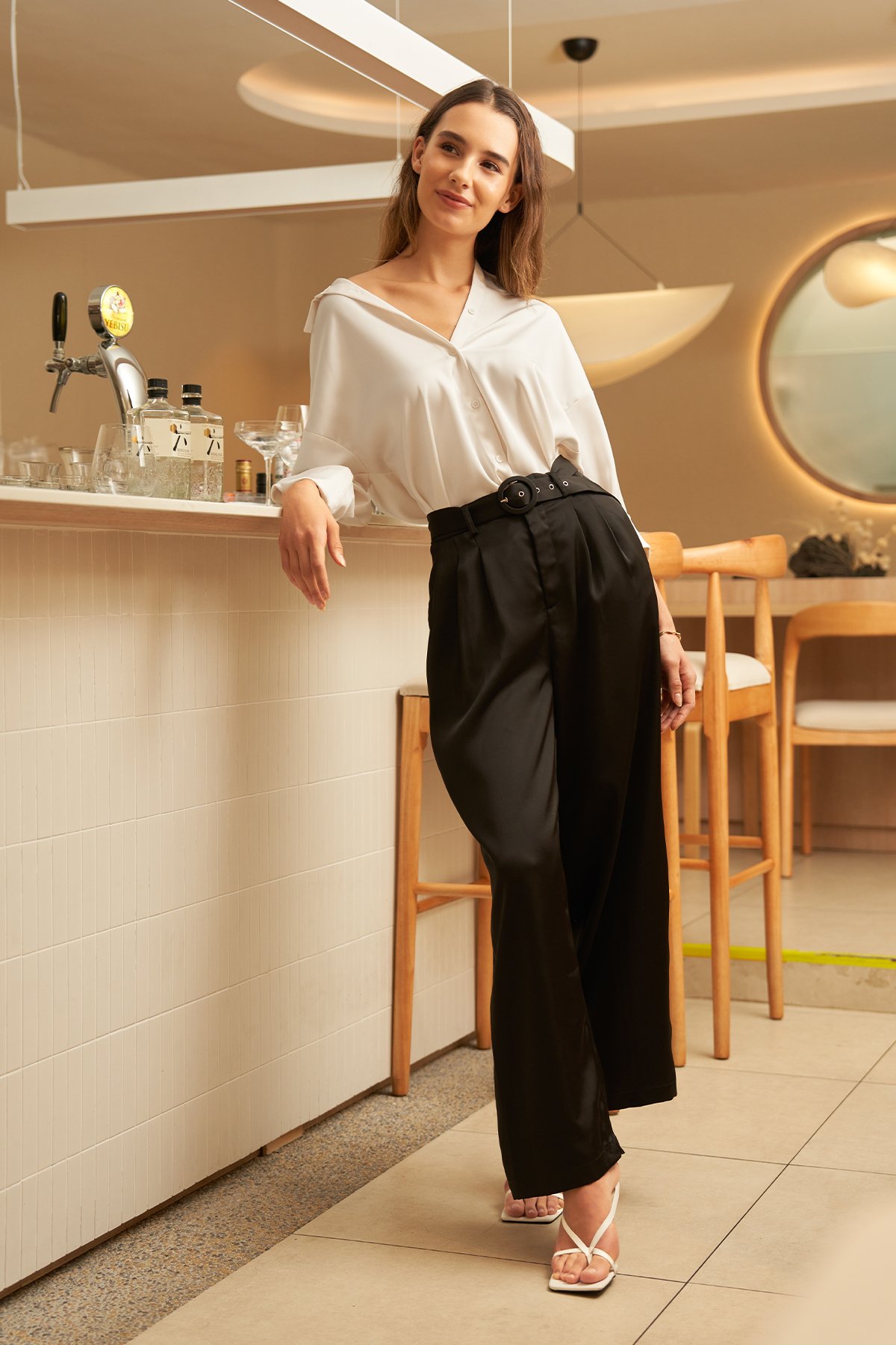 https://dum76bmz7do3s.cloudfront.net/sites/files/theclosetlover/images/products/202311/1200xAUTO/03124launch_0020_lenne_satin_belted_pants_1.jpg